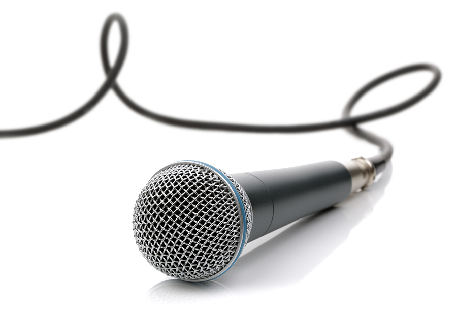 Microphone with cable connected ready for an interview, singing